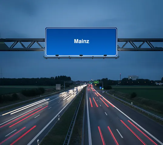 Motorway sign to Mainz at dusk